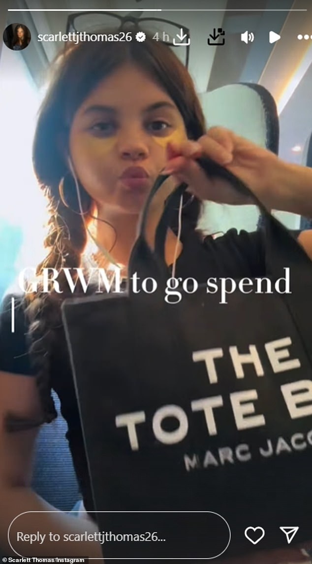 Scarlett started the video wearing hydrating eye masks before showing off her £195 Marc Jacobs black The Tote Bag and pulling out her makeup
