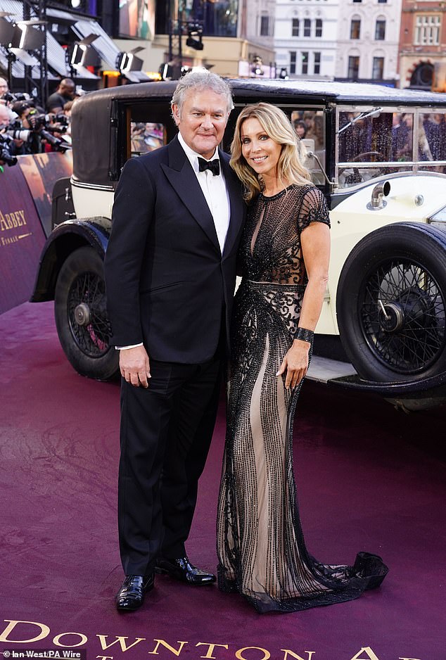 Hugh cut a very dapper figure in a black tuxedo which he paired with a crisp white shirt and bow tie
