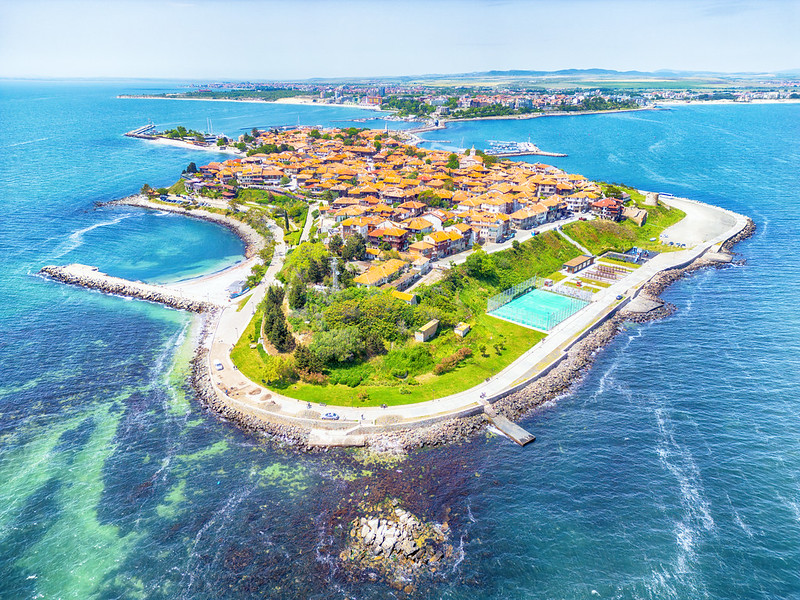 Aerial view of a coastal town on a peninsula.