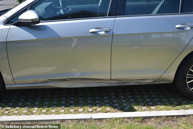 Damage to the side of a car caused by the kerb in Salisbury, Wiltshire - one of at least 11,000 reported incidents in recent months