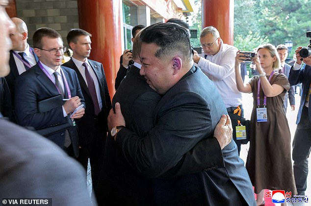 The pair were pictured embracing in a rare snap during their trip to China