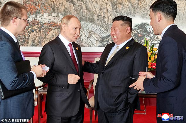 The world leaders were seen laughing during their trip yesterday