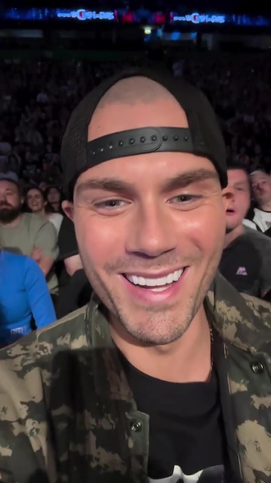 Close-up selfie of Max George at a WWE event.