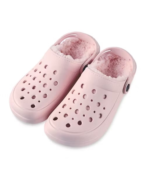 Pair of pink fleece-lined clogs.