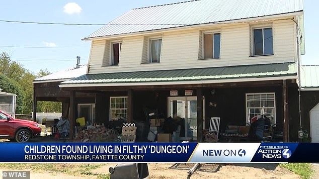 Police say the children were sequestered to a bedroom with boarded-up windows, feces covering the walls, fleas, a limited amount of food and clothing and no beds inside the Redstone Township home