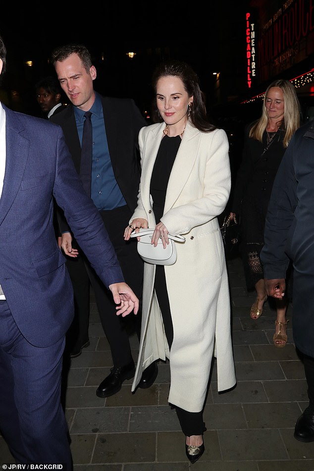 The actress, 43, revealed her growing baby bump to the world as she walked the red carpet at the Odeon Luxe in Leicester Square