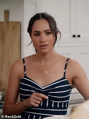 Meghan wearing a striped Veronica Beard dress on series 2 of her new Netflix show