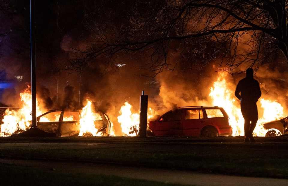 Burning cars during a protest in Malmo.