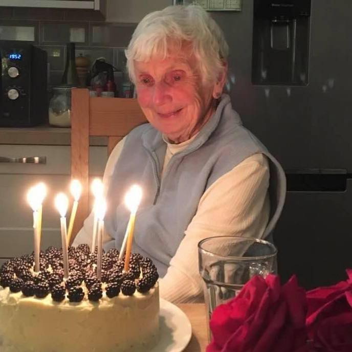 Daphne Stallard, smiling at her birthday cake.