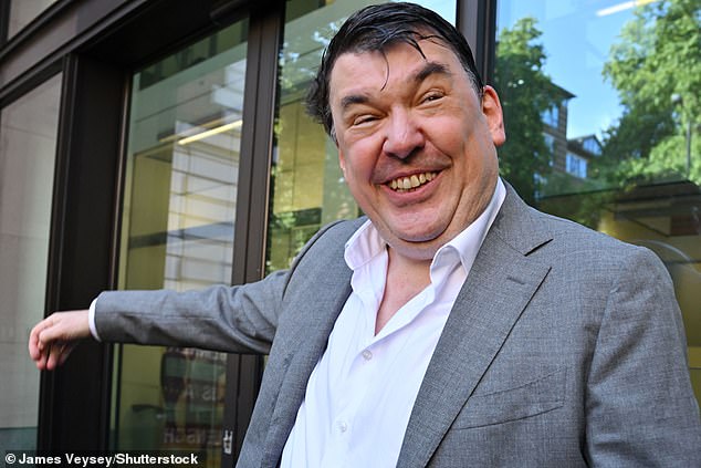 Linehan smiles outside Westminster Magistrates' Court today ahead of his trial
