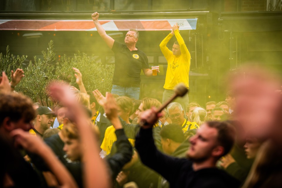 Vitesse fans celebrating in Arnhem after court appeal victory.