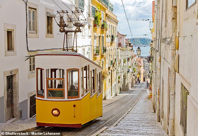 The funicular railway line is capable of carrying up to 43 people and is one of three of its kind in Lisbon (stock image)