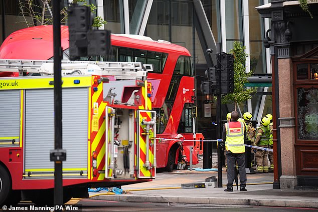 The bus reportedly mounted the pavement, injuring a number of pedestrians and passengers. The bright red people-mover's driver has been taken to hospital, along with a number of other people, emergency services said today