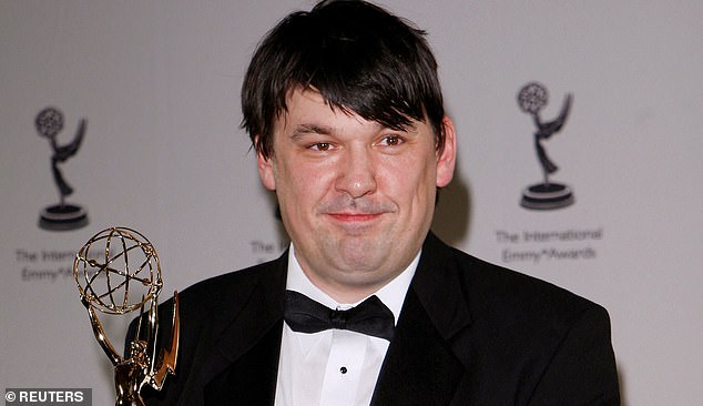FILE PHOTO: Irish writer and director Graham Linehan celebrates after winning Best Comedy at the 36th International Emmy Awards Gala in New York, November 24, 2008. REUTERS/Chip East (UNITED STATES)/File Photo