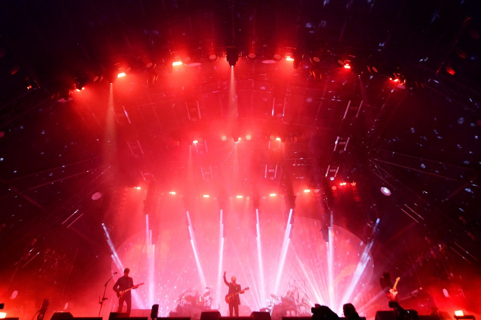 Radiohead performing on stage.