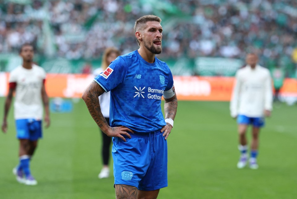 Robert Andrich of Bayer Leverkusen reacts during a Bundesliga match.