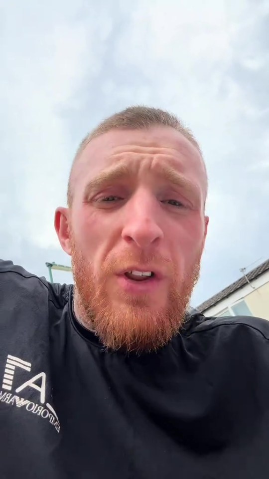 Man speaking to camera.