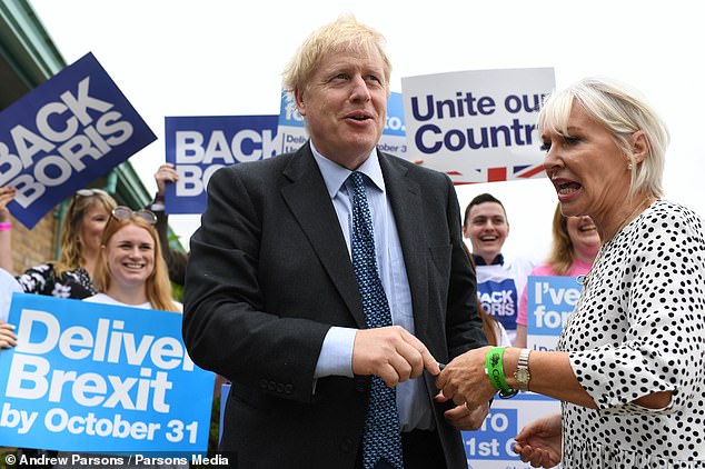 Ms Dorries with former prime minister Boris Johnson campaigning in 2019