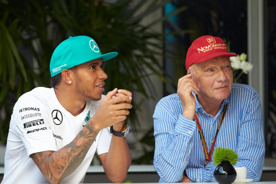 Lewis Hamilton and Niki Lauda in conversation.