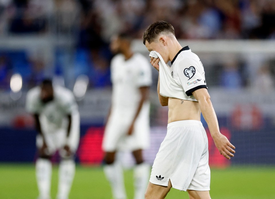 Florian Wirtz looking dejected after a soccer match.