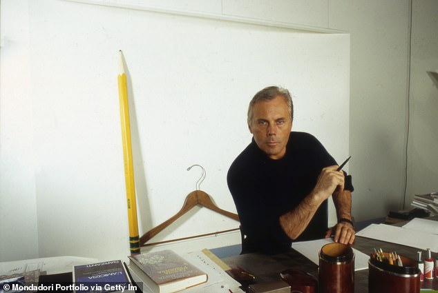 Armani, pictured here in his office in 1984, was synonymous with modern Italian style and elegance