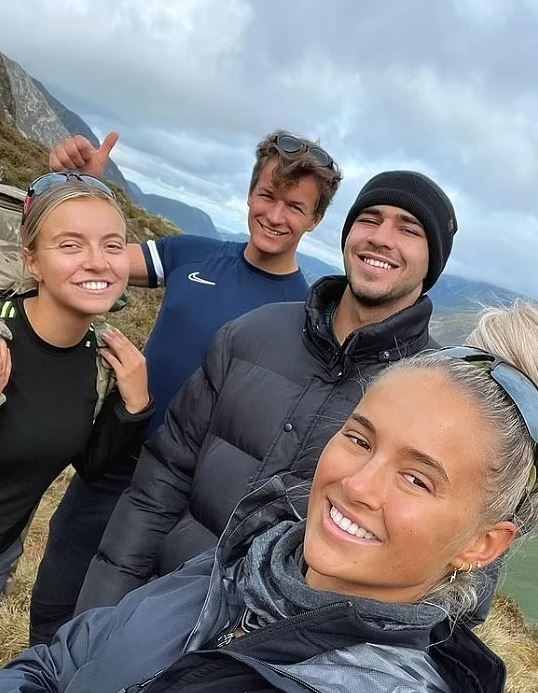 Molly-Mae Hague's sister Zoe with three other people on a mountain.