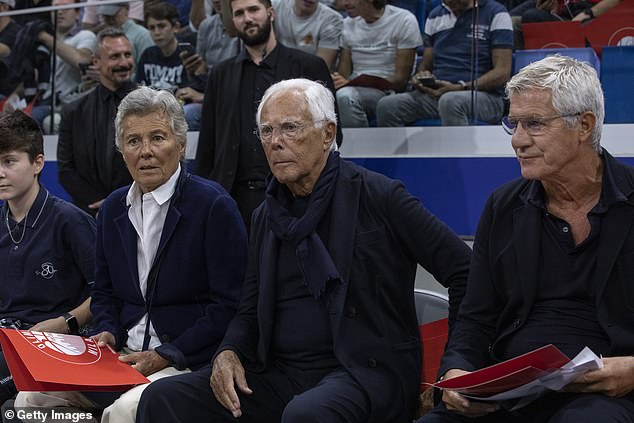 Giorgio Armani (C) sits between his sister Rosanna Armani (L) and president of AX Armani Exchange Olimpia Milano Pantaleo Dell'Orco (R) during the friendly match between AX Armani Exchange Olimpia Milano and Urania Basket Milano at Allianz Cloud on September 19, 2019