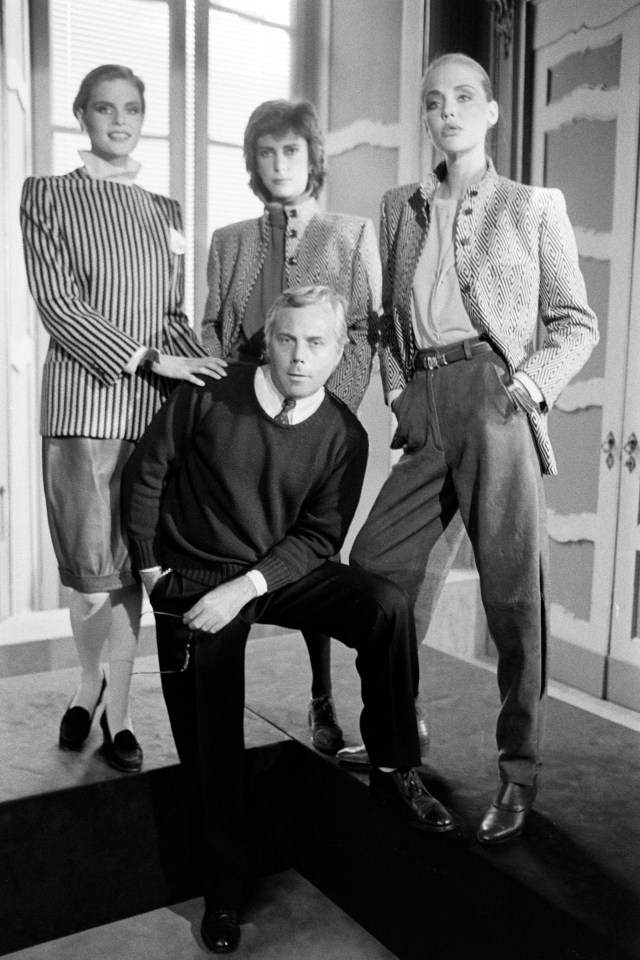 Giorgio Armani with models.
