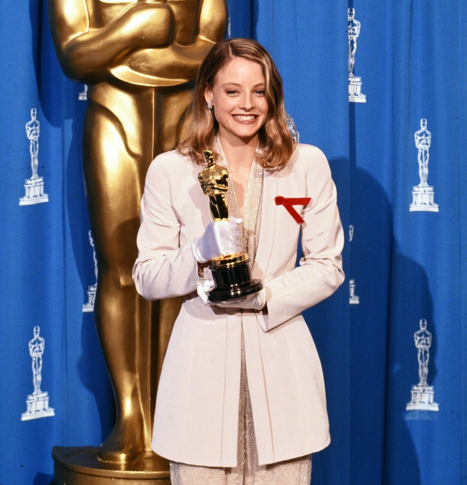 Jodie Foster holding her Oscar for Best Actress at the 64th Academy Awards.
