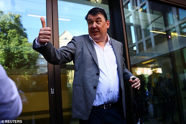 The comedy writer put his thumb up to the crowd before entering the court on Thursday
