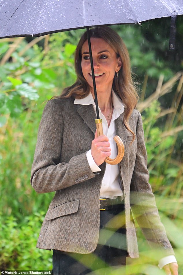 The Princess of Wales expertly dealt with the sudden downpour and remained in cheery spirits