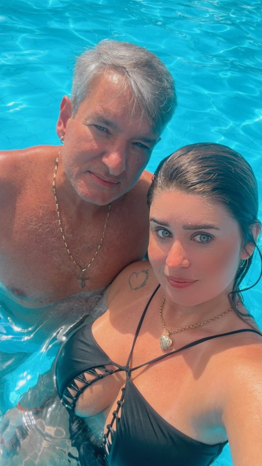 Woman and man in a swimming pool.