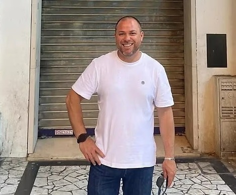 Black and white photo of Pedro Trinidade, a former volleyball referee.