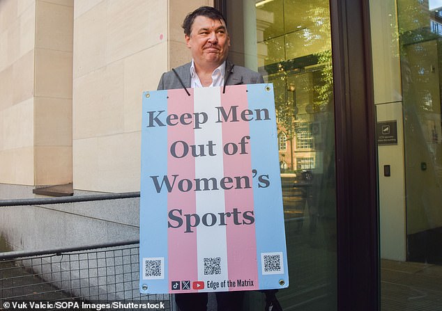 Linehan arrived at court yesterday wearing a sandwich board bearing gender-critical statements