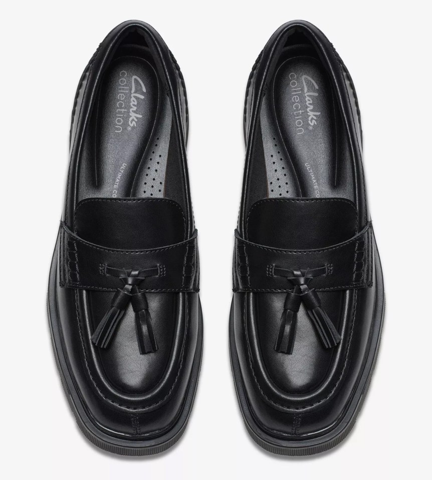 Pair of black tassel loafers.