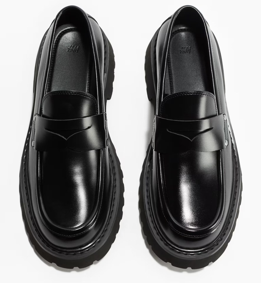 Pair of black leather loafers with chunky soles.