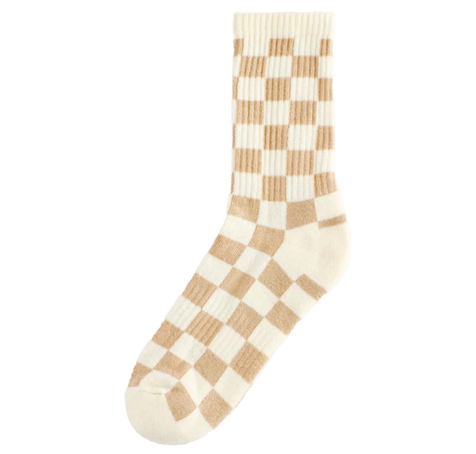 Cream-colored sock with brown checkered pattern.