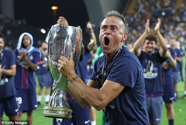 Enrique, pictured after his team won the UEFA Super Cup, was involved in a cycling accident