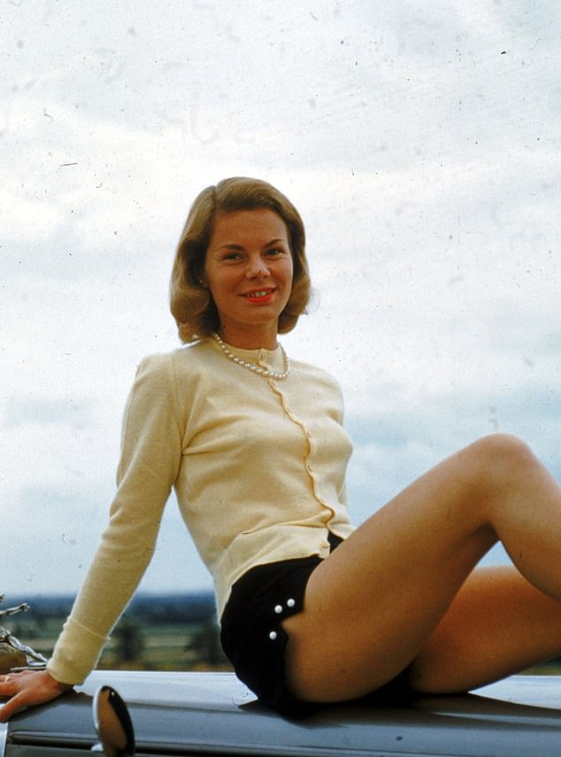 Pictured: the Duchess of Kent poses on a car bonnet in 1960, the year before her marriage to Prince Edward, the Duke of Kent