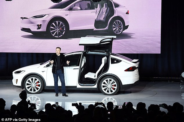 The ten-year package is thought to amount to the largest pay deal in corporate history. Pictured: Tesla CEO Elon Musk speaks at the Model X launch event in Fremont, California, on September 29, 2015