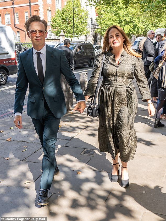 Tom - who attended Sylvia's stage school - was supported by his wife Giovanna Fletcher at the funeral