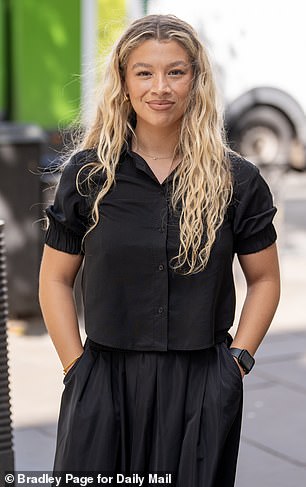 Newly-engaged Molly Rainford (pictured) sweetly smiled at the funeral