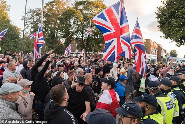 Demonstrators gather outside The Civic Offices in a protest against housing of asylum seekers at The Bell Hotel in Epping, United Kingdom on August 31, 2025