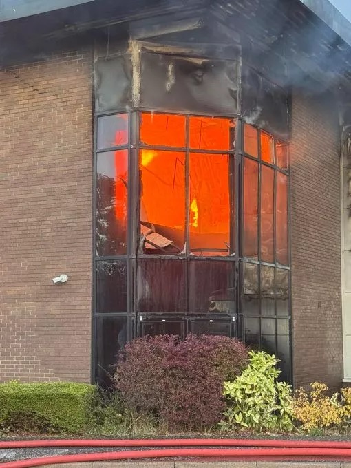 Large fire burning inside a building.
