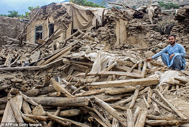 Now, survivors and rescuers have reportedly claimed that several women were deliberately excluded from the first quake's rescue effort due to the strict religious code, meaning that men were unable to touch them. Pictured: An Afghan man views the aftermath of Sunday's earthquake in the Dara-i-Nur district of Nangarhar province on September 3