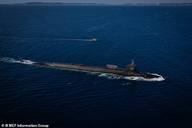 The SEAL Team 6 - the same unit that killed Osama Bin Laden - was deployed from a US Ohio-class nuclear submarine (pictured) before sneaking into the coastline in mini-subs