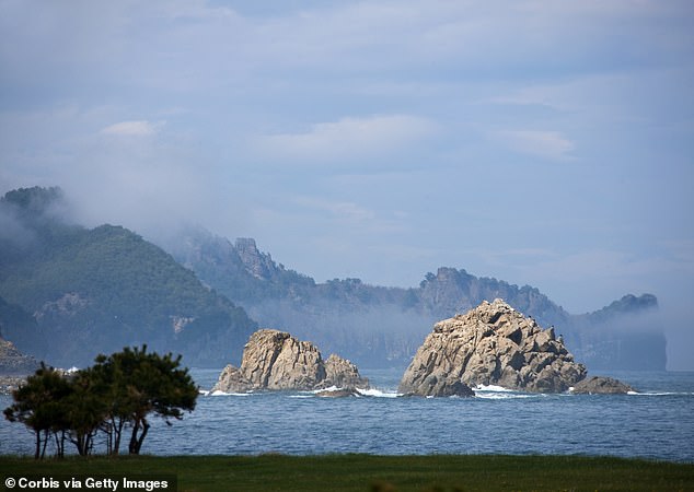 The bold plan was for a small team of SEALs to sneak onto the North Korean coastline (pictured) and plant a bug on Kim Jong Un's residence before sneaking away undetected