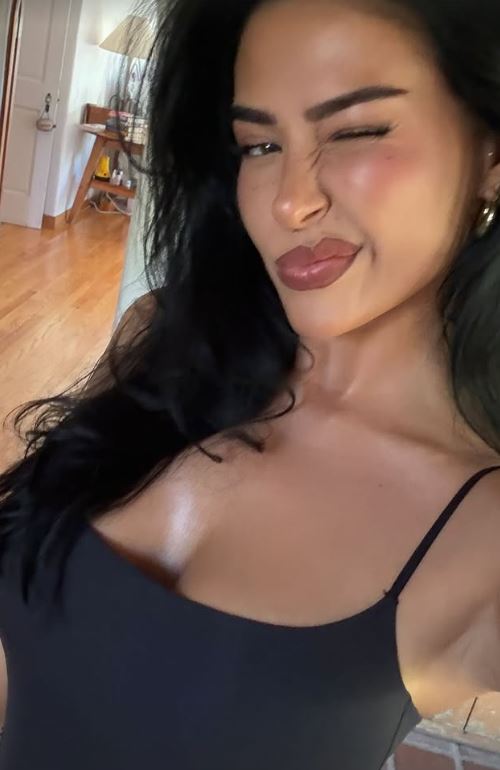 Selfie of a woman winking.