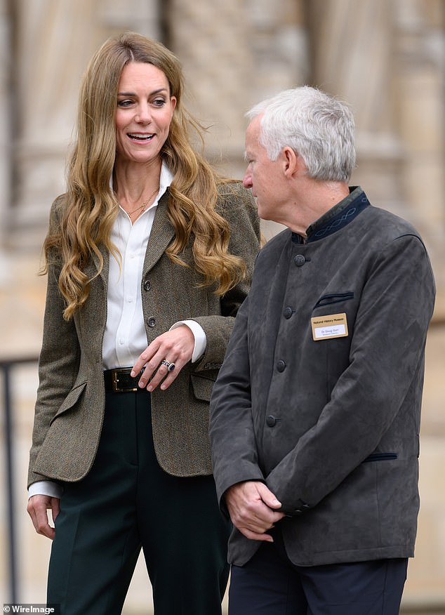 The Princess laughed and chatted with museum staff during her visit, tucking her new 'do behind her ear as she listened intently