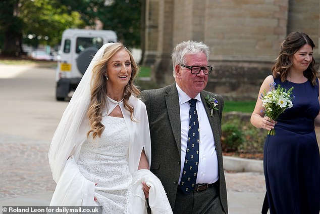 Phillip Serrell with his daughter Clemmie at her wedding at Worcester Cathedral